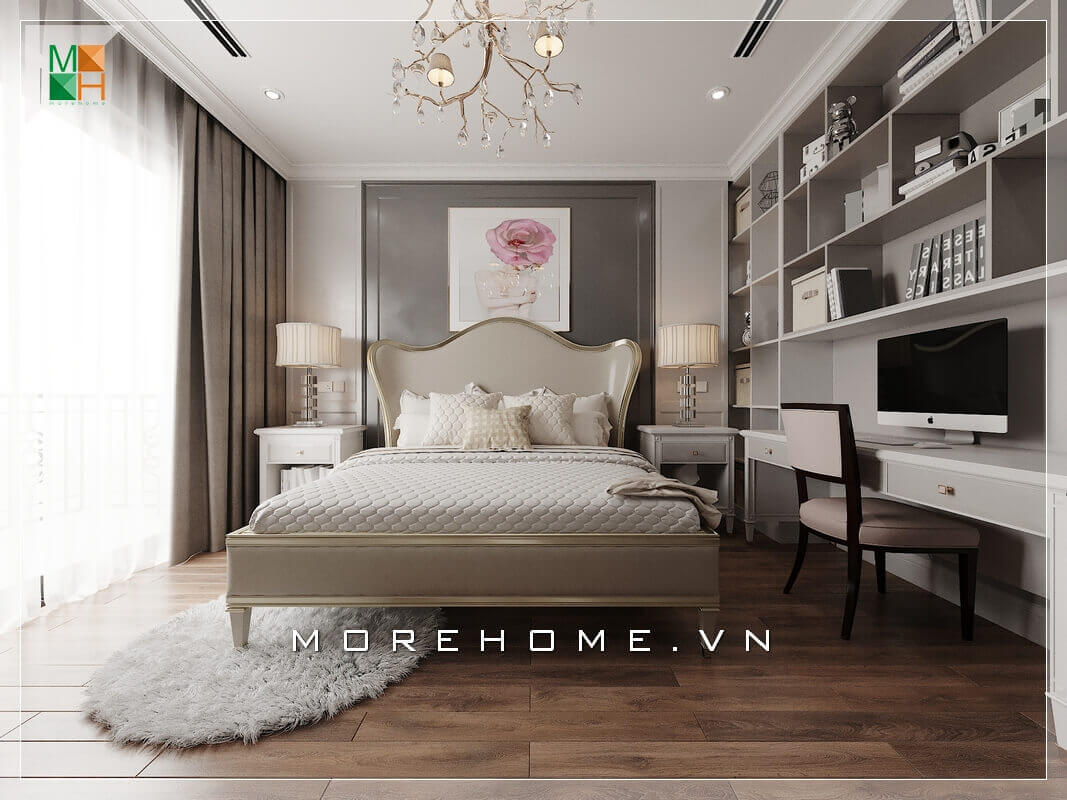 Ấn tượng với mẫu bàn làm việc phòng ngủ chung cư kết hợp kệ sách treo tường đẹp mắt, thiết kế phù hợp với không gian phòng ngủ. Điểm nhấn của căn phòng ngủ tân cổ điển ngoài chiếc giường ra thì cây đèn chùm treo trần và 2 đèn ngủ được đặt 2 bên đầu giường cũng hết sức tinh tế và sang trọng.  Thiết kế phòng ngủ chung cư