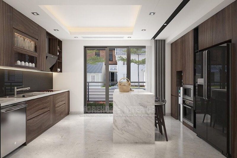 Sắp xếp phòng bếp hiện đại  khoa học bước tới tủ lạnh để đồ trên bàn đảo, với không gian rộng cả nhà có thể phụ giúp, bồn rửa gần bếp nấu, khi xong bạn có thể quay ra bày trí thỏa mái từ chiếc bàn đảo của mình.